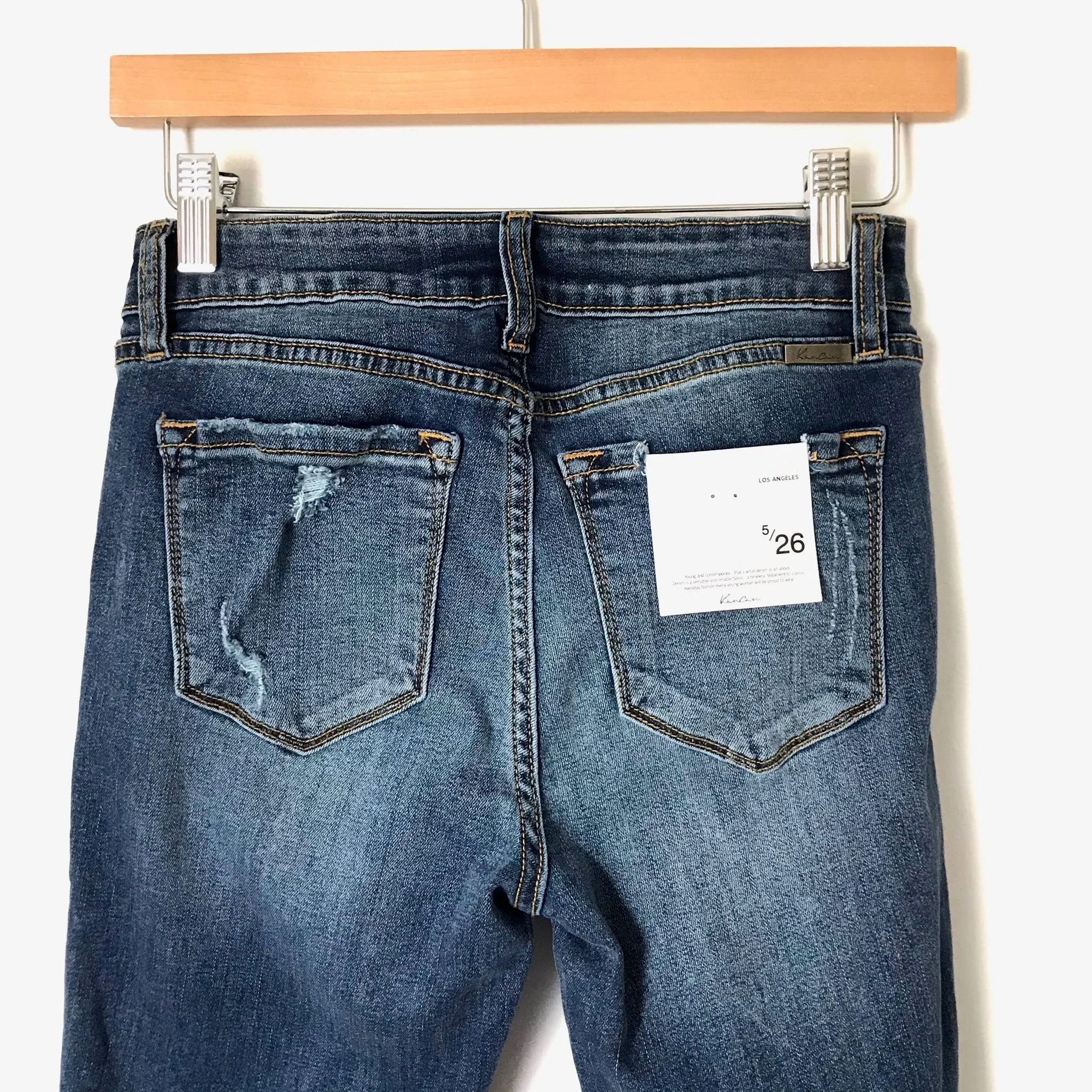 KanCan Dark Wash Jeans Angled Raw Hem NWT- Size 26 (Inseam 25”)